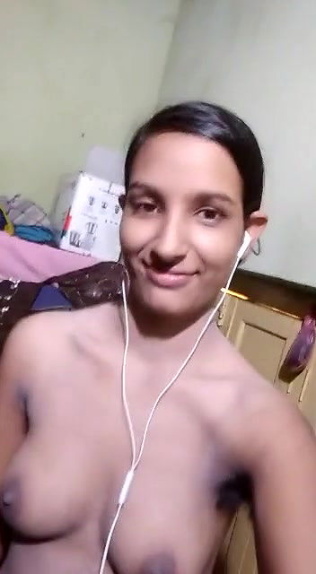 Cute college girl showing her assets on cam selfie video