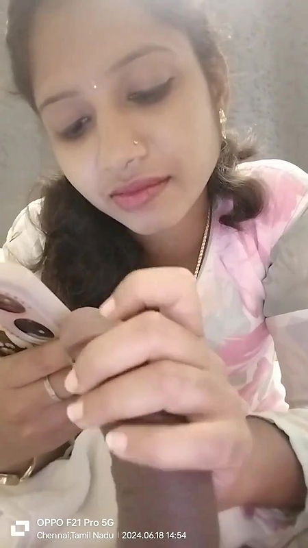 Tamil Girl Gives A Handjob While Talking With Her Lover