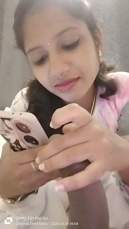 Tamil Girl Gives A Handjob While Talking With Her Lover