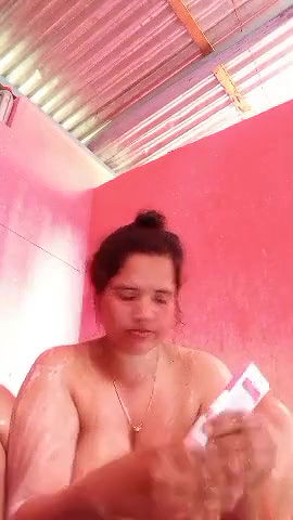 beautiful horny village milf bathing