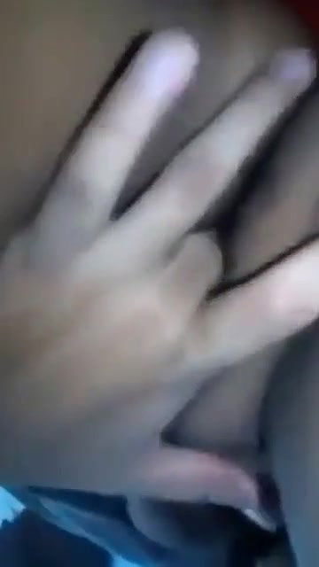 Horny girl fingering pussy displaying her sexy boobs