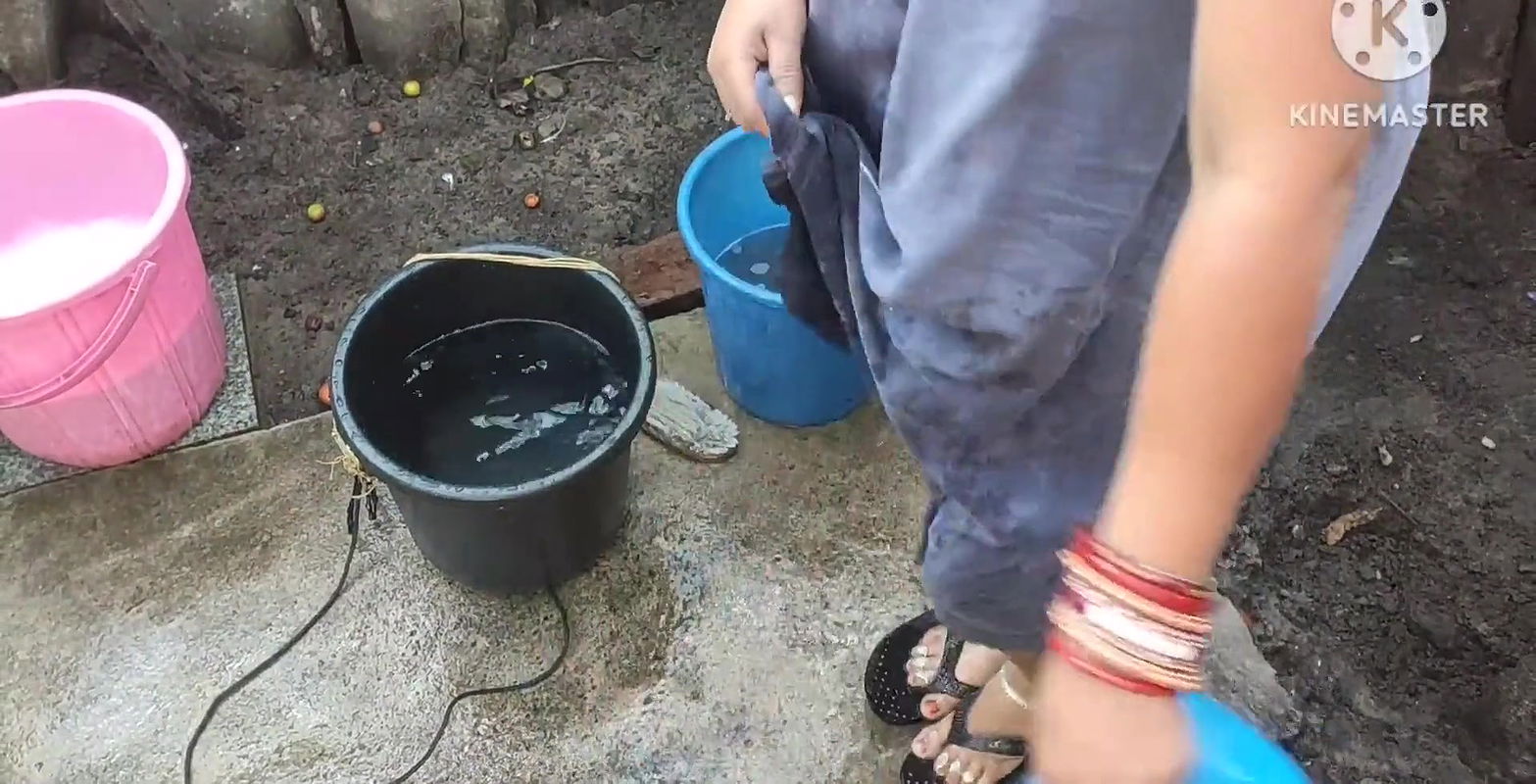 Indian bathing outside with hot boobs