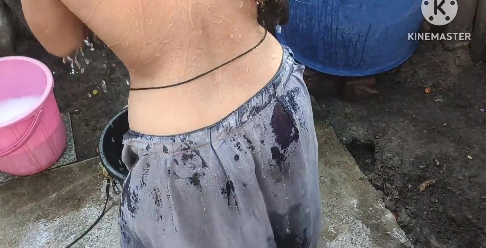 Indian bathing outside with hot boobs