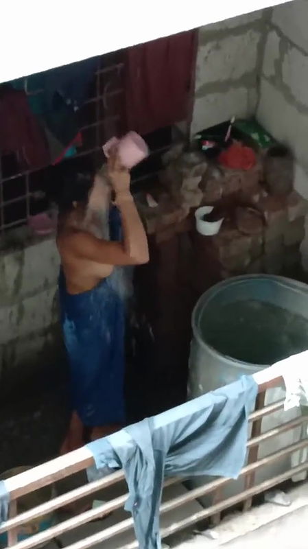 Desihub tv  Desi bhabhi bathing on balcony captured by spycam