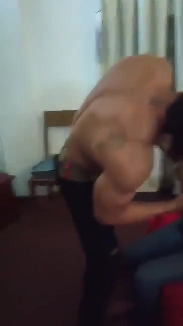 hunk guy with topless girl