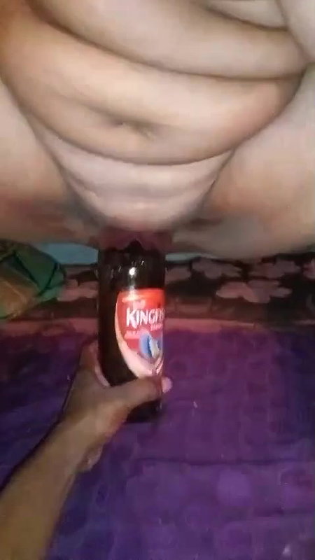 Desi milf puts a beer bottle