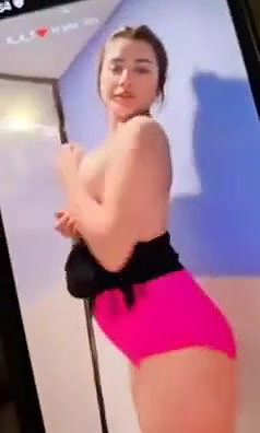 cute beautiful girl showing her big boobs in bathroom to bf smile