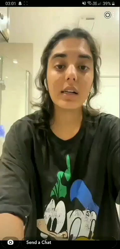 beautiful girlfriend lifting t shirt and showing boobs