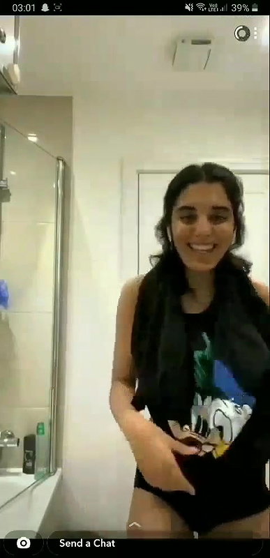 beautiful girlfriend lifting t shirt and showing boobs