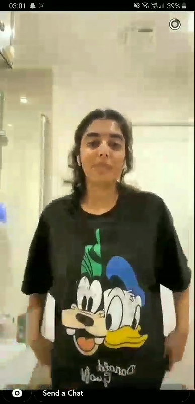 beautiful girlfriend lifting t shirt and showing boobs