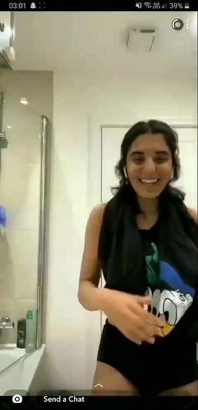 beautiful girlfriend lifting t shirt and showing boobs