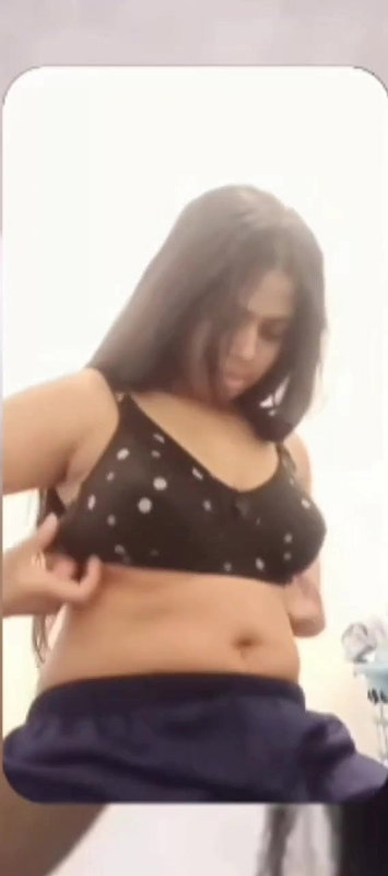 chubby shy Indian girl showing round boobs to lover