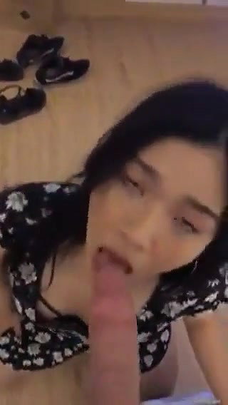 Asian girl sucking dick