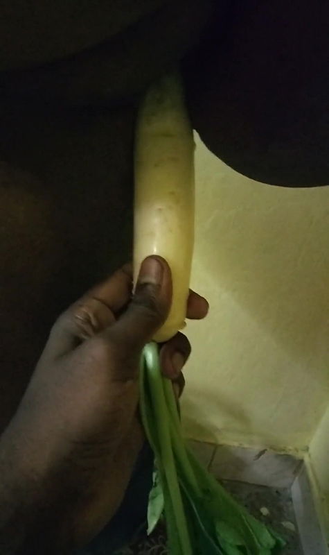 Inserting A Vegetable Into Her Pussy
