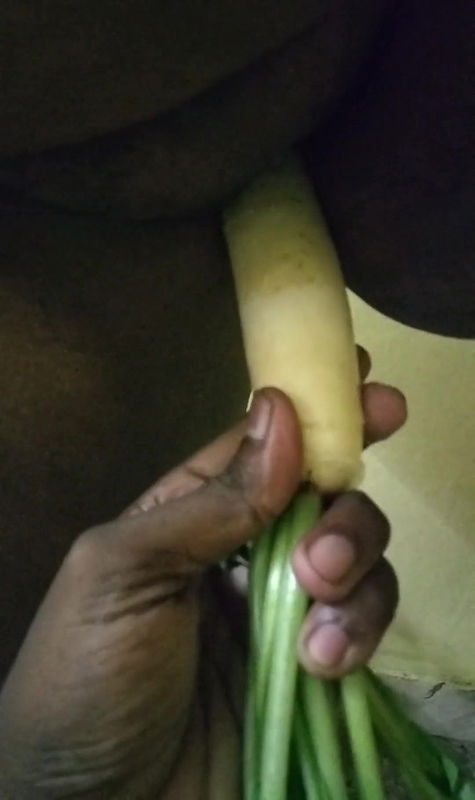 Inserting A Vegetable Into Her Pussy
