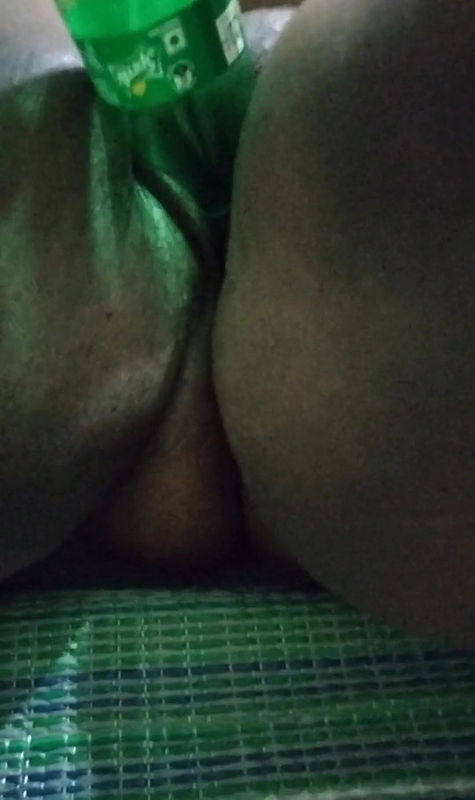 Inserting Sprite cool drinks bottle. Hot video