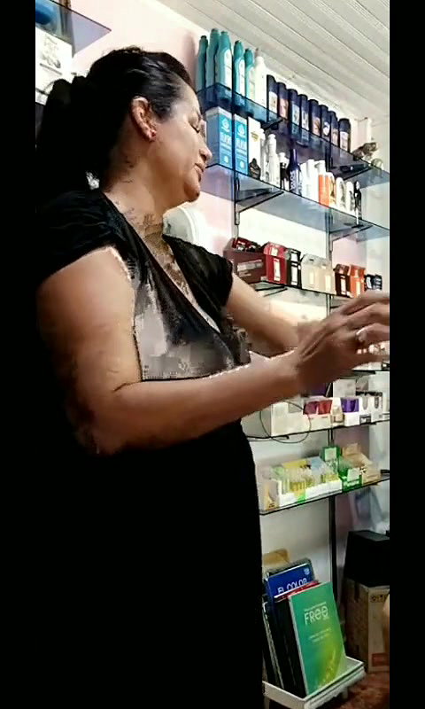Hot milf in shop teasing