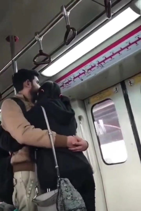 Couple kissing in delhi metro