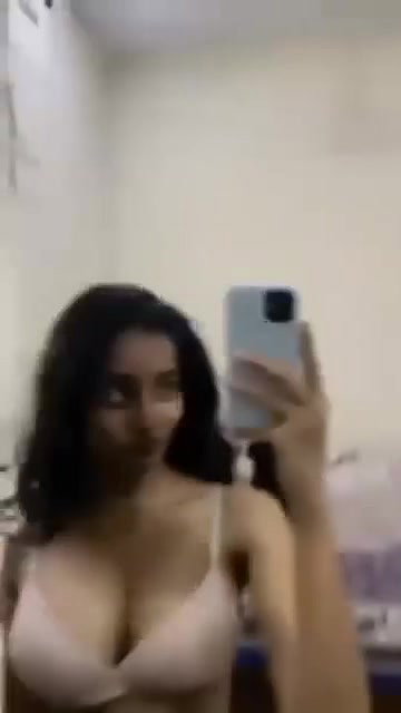 Cute chasmish girl playing with boobs