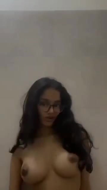 Cute chasmish girl playing with boobs