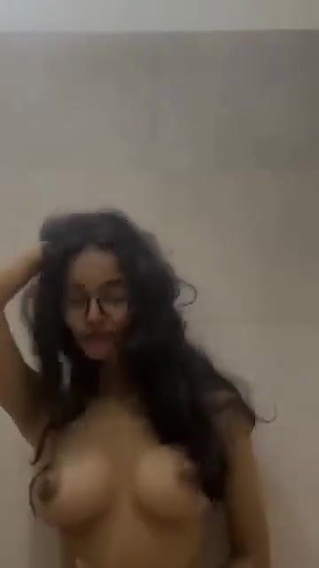 Cute chasmish girl playing with boobs