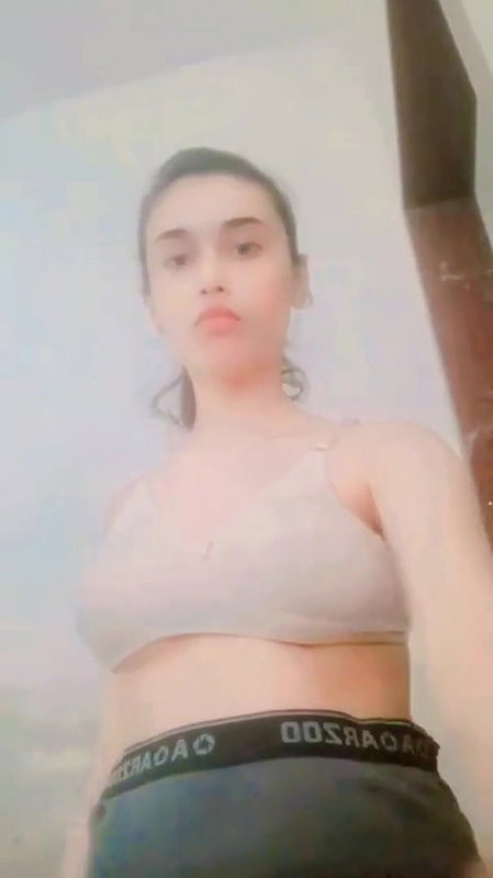desi girl pulling up bra