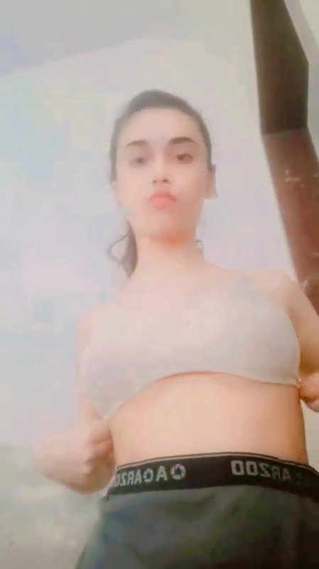 desi girl pulling up bra