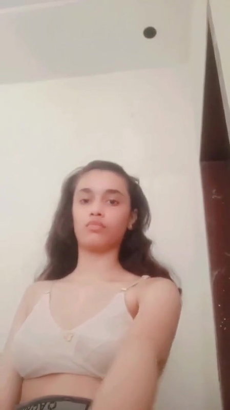 desi girl pulling up bra