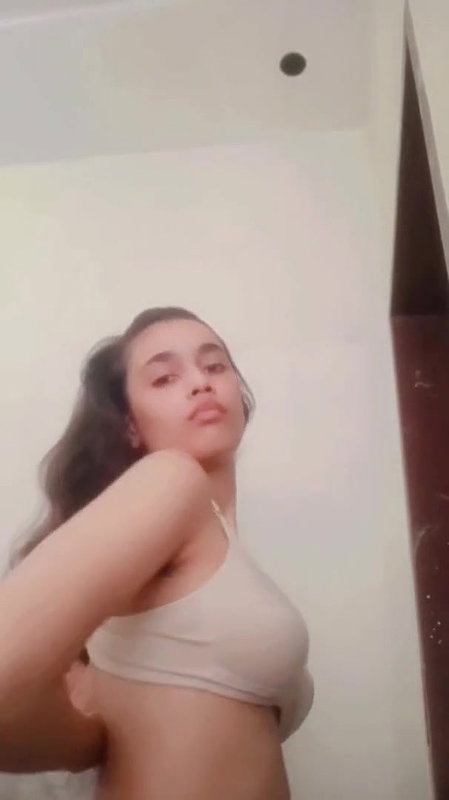 desi girl pulling up bra