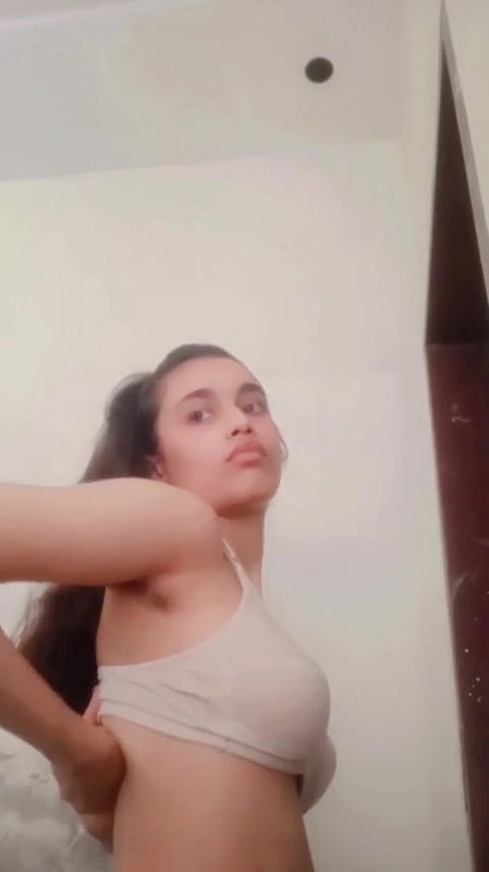 desi girl pulling up bra