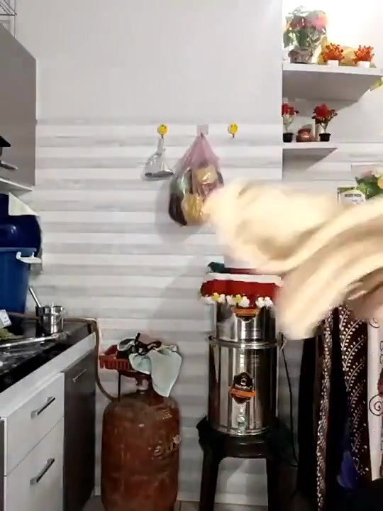 Hot desi bhabhi showing boobs in Kitchen