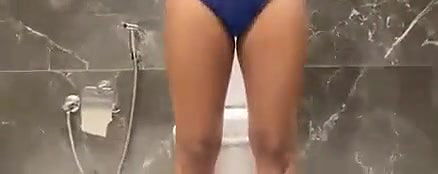 sexy babe doing pee in front of camera