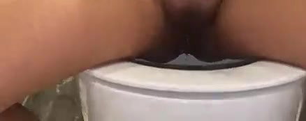 sexy babe doing pee in front of camera