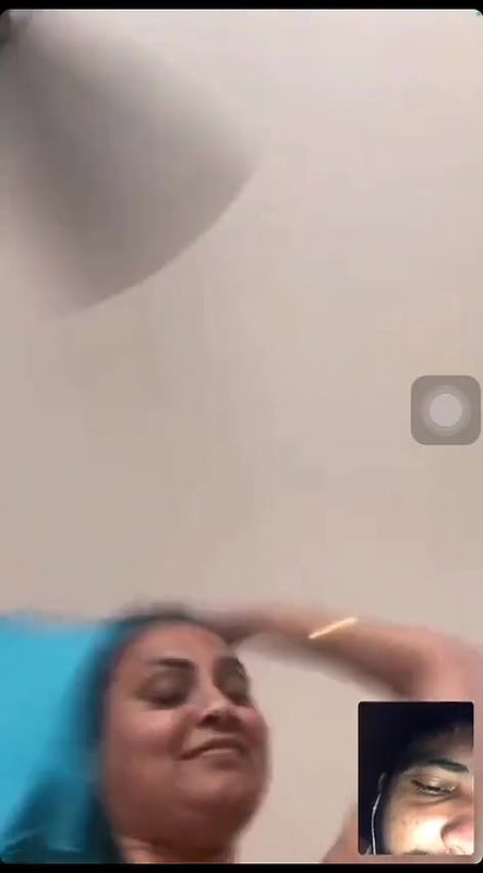 mature MILF video call on iPhone showing nudity