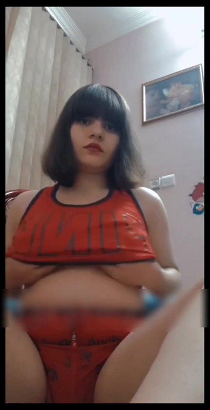 short haired girl playing with her big boobs