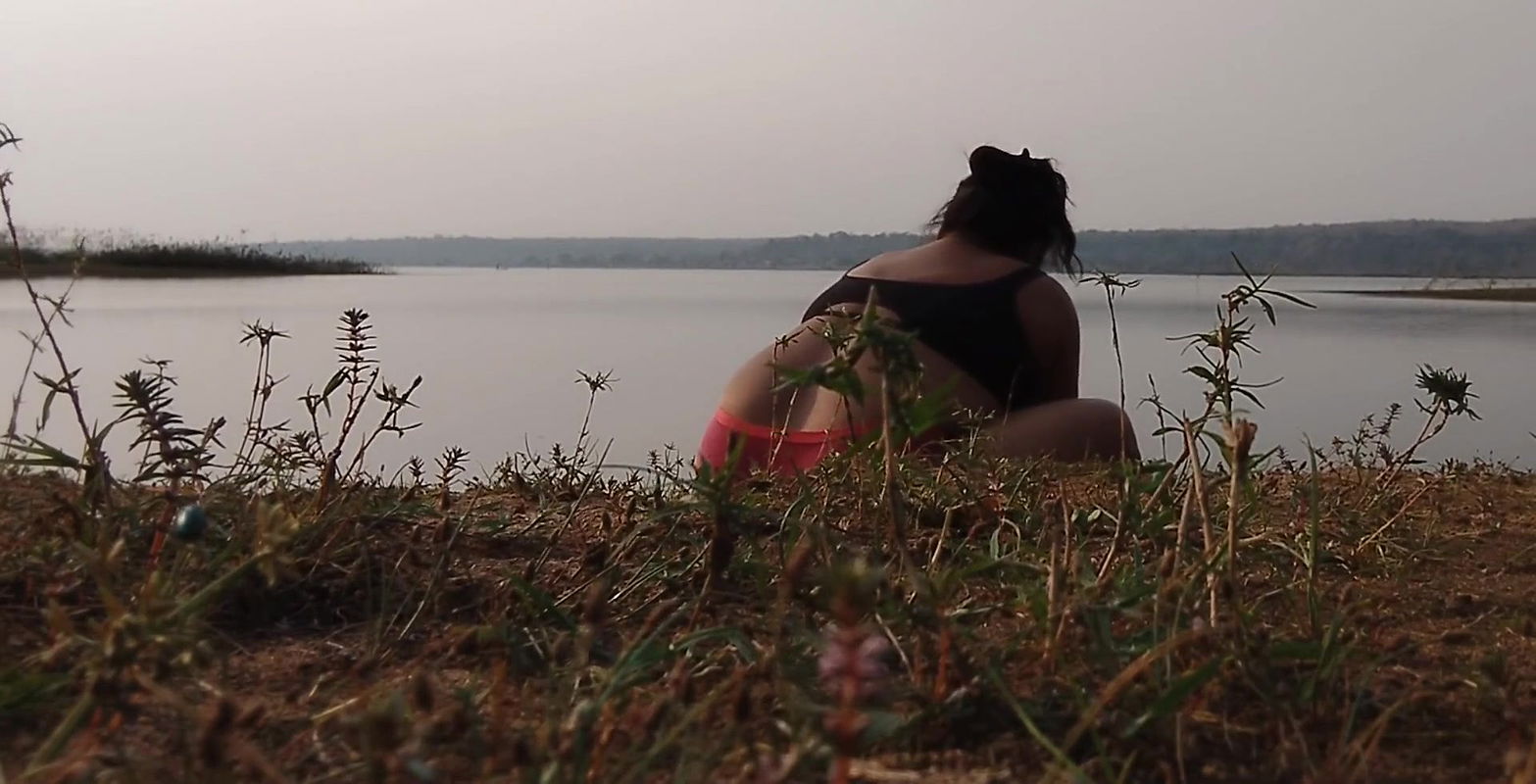 Hot desi sexy girl having fun here with village boyfriend taking bath on river.    .