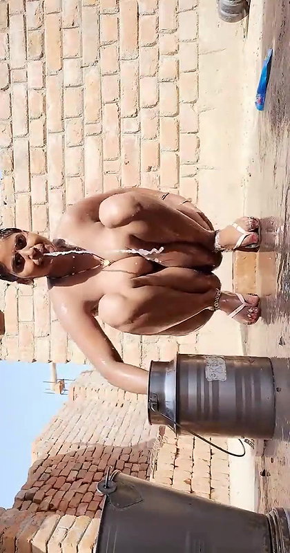 big boobs village bhabhi viral bathing outdoors