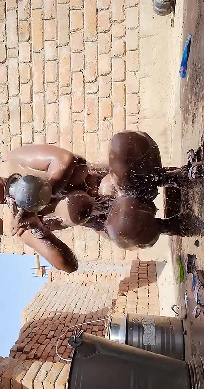 big boobs village bhabhi viral bathing outdoors