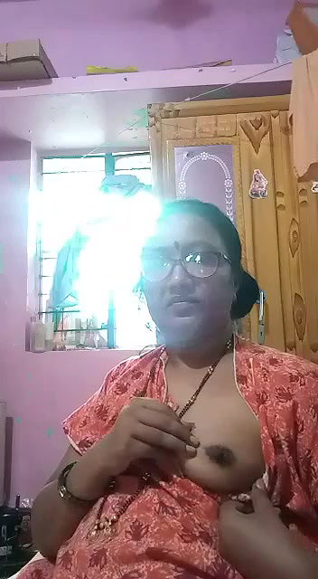 Indian mature aunty showing boobs to lover