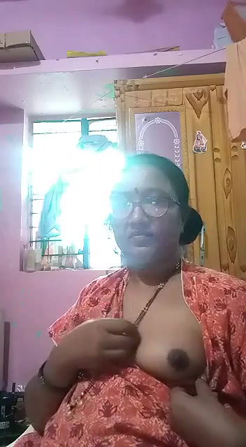 Indian mature aunty showing boobs to lover