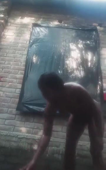 Bengali village girl bathing outdoors clip