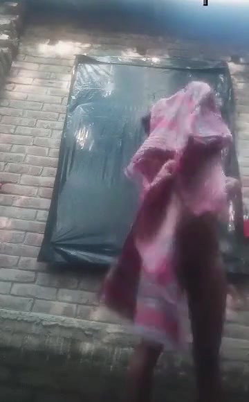 Bengali village girl bathing outdoors clip