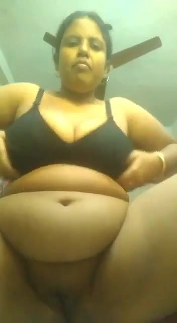 MILF showing big boobs and fingering pussy