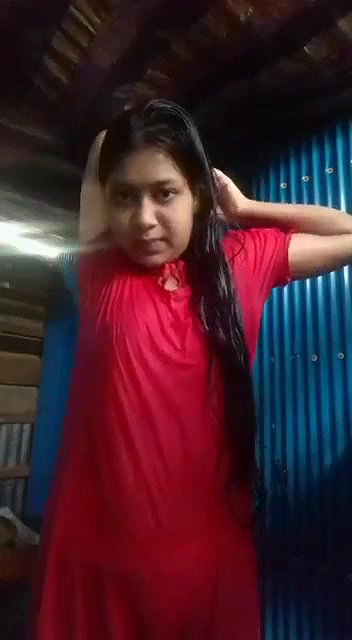 cute slum girl recording her own dress change