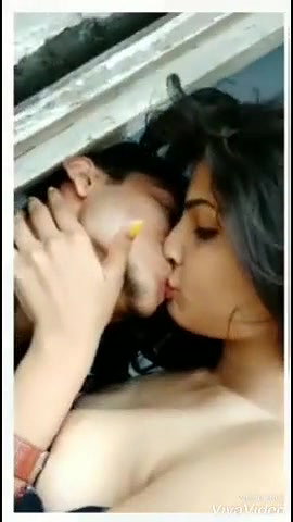young couple kissing boobs sucking