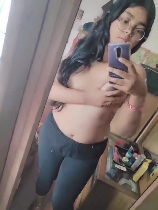 cute college girl in glasses showing boobs