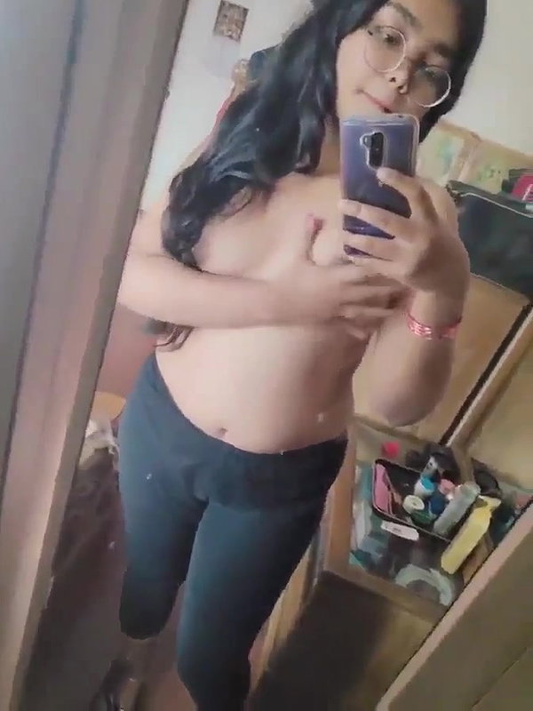 cute college girl in glasses showing boobs