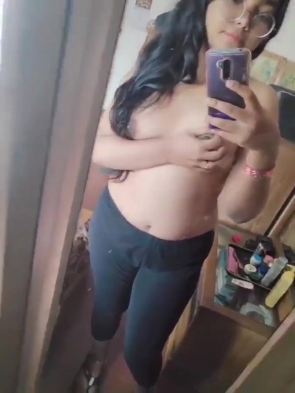 cute college girl in glasses showing boobs