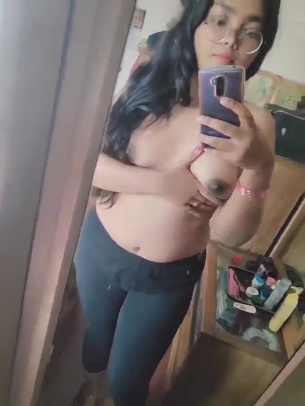 cute college girl in glasses showing boobs