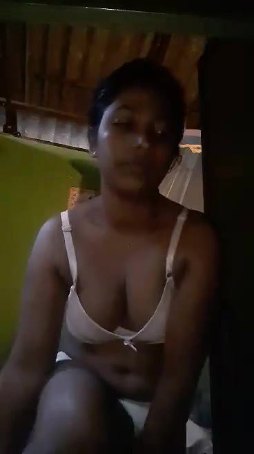 Cute village girl wearing clothes in front of cam